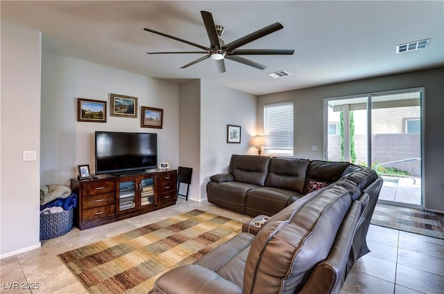 5854 Olivine Falls Ave, Las Vegas, NV 89130 - living room featuring ceiling fan, light tile patterned floors, and baseboards