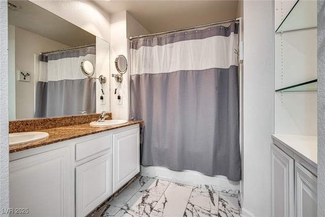 35 E Agate Ave Unit 208, Las Vegas, NV 89123 - full bath featuring marble look tile flooring, double vanity, and shower / bath combination with curtain