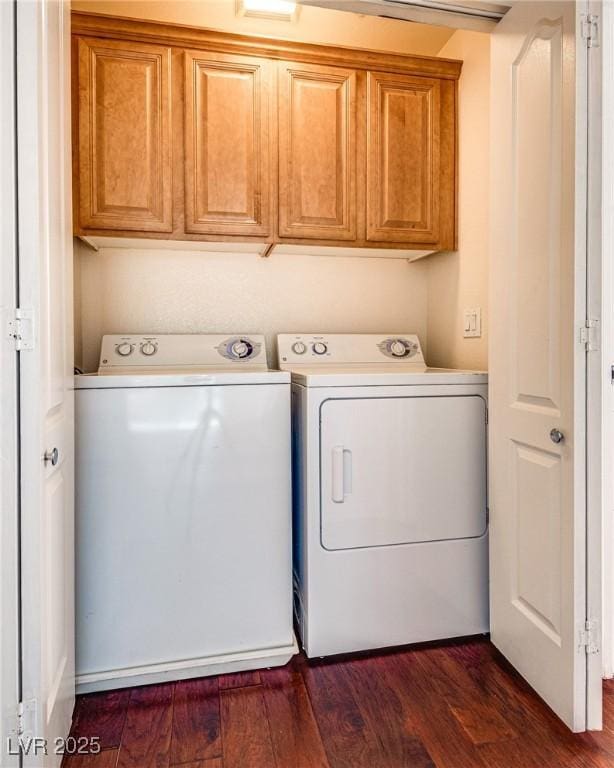 35 E Agate Ave Unit 208, Las Vegas, NV 89123 - washroom featuring independent washer and dryer, cabinet space, and dark wood-style floors