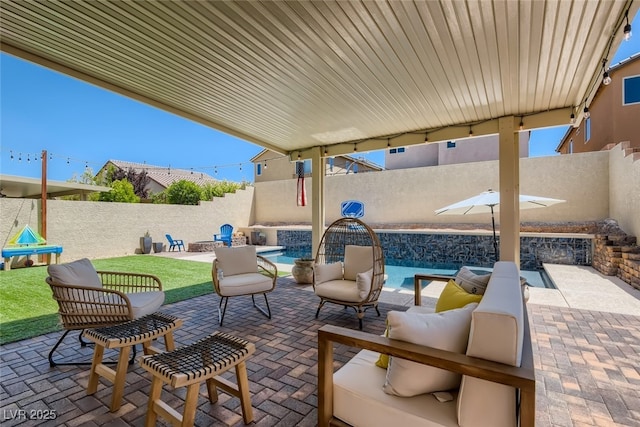 7761 Sagamore Bay Ct, Las Vegas, NV 89179 - fenced backyard featuring a patio and an outdoor hangout area