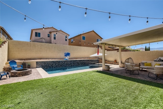 7761 Sagamore Bay Ct, Las Vegas, NV 89179 - view of pool featuring a patio area and an outdoor living space with a fire pit
