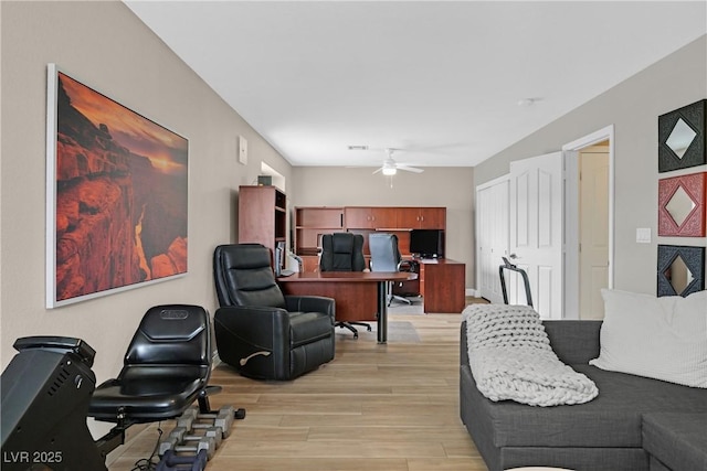 1780 Crystal Stream Ave, Henderson, NV 89012 - living room featuring a ceiling fan, light wood-type flooring, and a desk