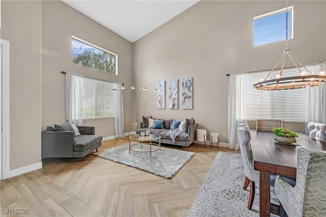 1780 Crystal Stream Ave, Henderson, NV 89012 - living area with high vaulted ceiling and a chandelier