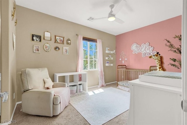 9869 Lime Tree St, Las Vegas, NV 89178 - bedroom with light carpet, baseboards, and ceiling fan