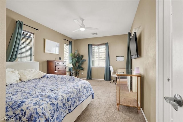 9869 Lime Tree St, Las Vegas, NV 89178 - bedroom with light carpet, baseboards, and ceiling fan