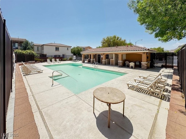 9869 Lime Tree St, Las Vegas, NV 89178 - community pool featuring a patio area