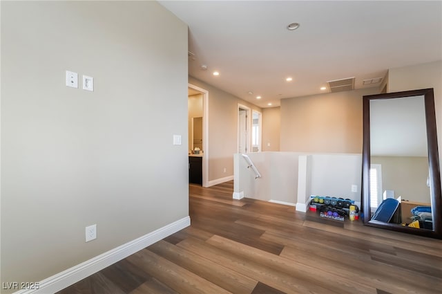 2575 Hazelburn Ave, Henderson, NV 89044 - spare room with wood finished floors, recessed lighting, and baseboards
