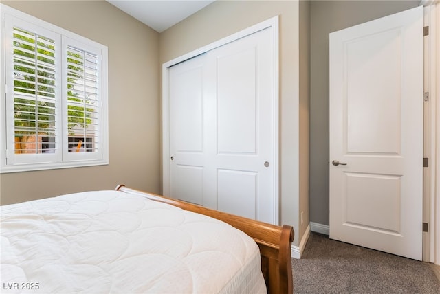 2575 Hazelburn Ave, Henderson, NV 89044 - bedroom with carpet floors, a closet, and baseboards