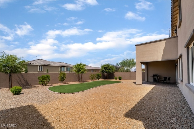 2575 Hazelburn Ave, Henderson, NV 89044 - fenced backyard with a patio area