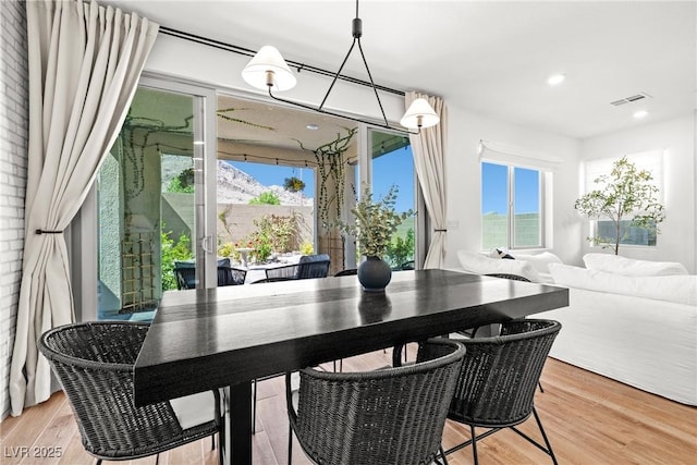 11652 Desert Hollow Ave, Las Vegas, NV 89138 - dining room featuring light wood-type flooring and recessed lighting