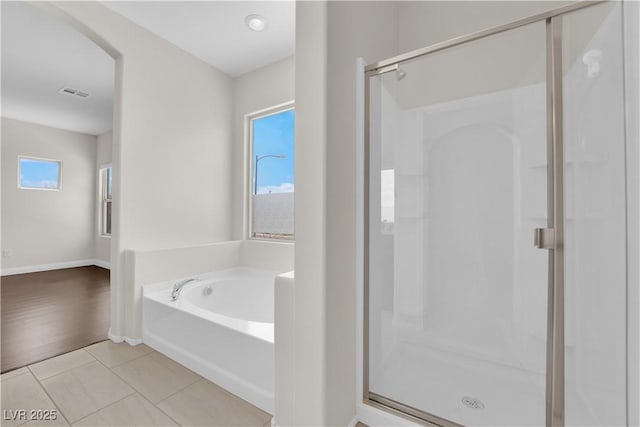 367 Wilford Springs St, Henderson, NV 89014 - full bath featuring a shower stall, a bath, tile patterned floors, and baseboards