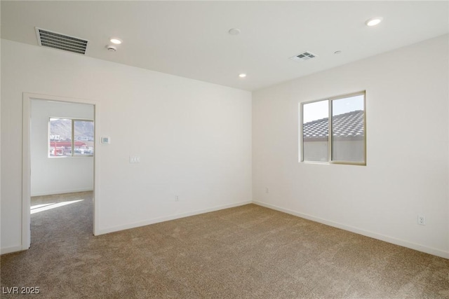 89 Via Franello, Henderson, NV 89011 - spare room featuring carpet, plenty of natural light, recessed lighting, and baseboards