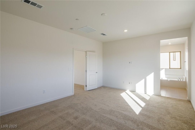 89 Via Franello, Henderson, NV 89011 - unfurnished room featuring light colored carpet, recessed lighting, and baseboards