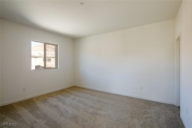 89 Via Franello, Henderson, NV 89011 - empty room with light colored carpet and baseboards