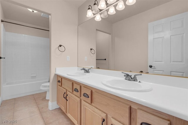 1312 Fragrant Spruce Ave, Las Vegas, NV 89123 - full bath featuring toilet, double vanity, tile patterned flooring,  shower combination, and baseboards