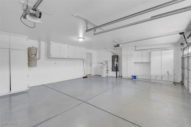 1312 Fragrant Spruce Ave, Las Vegas, NV 89123 - garage featuring a garage door opener, secured water heater, and a central vacuum unit