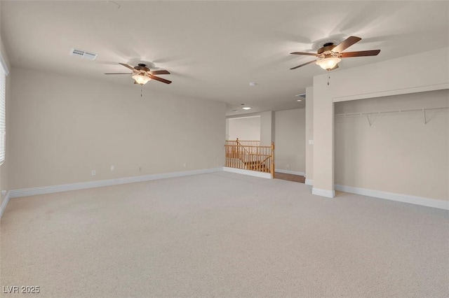 1312 Fragrant Spruce Ave, Las Vegas, NV 89123 - unfurnished living room with a ceiling fan and light colored carpet
