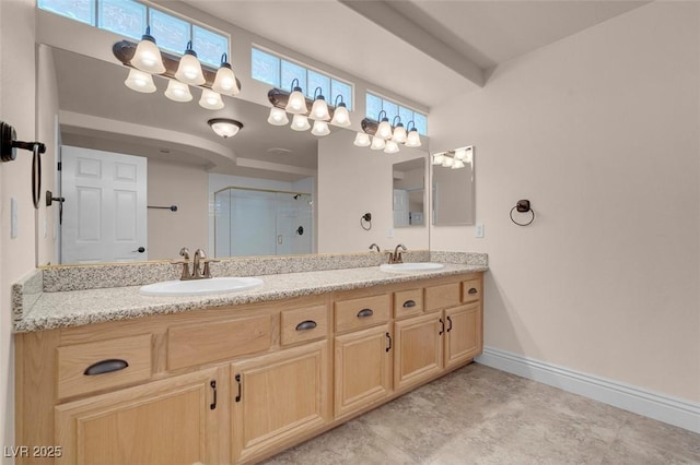 1312 Fragrant Spruce Ave, Las Vegas, NV 89123 - full bath with a stall shower, double vanity, and baseboards
