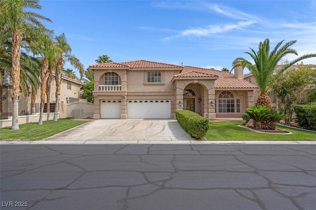1312 Fragrant Spruce Ave, Las Vegas, NV 89123 - mediterranean / spanish-style house with stucco siding, a tile roof, driveway, a garage, and a front lawn
