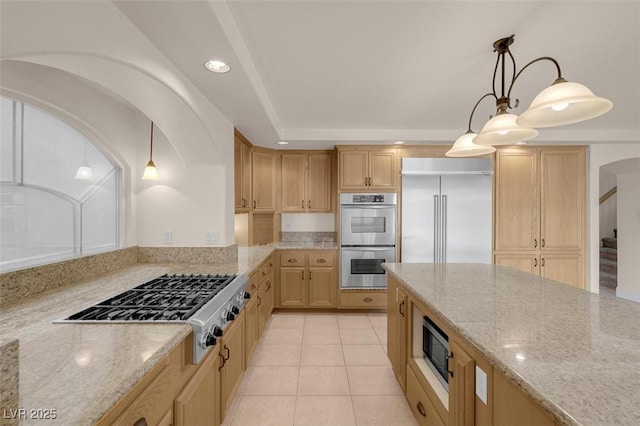 1312 Fragrant Spruce Ave, Las Vegas, NV 89123 - kitchen featuring built in appliances, light brown cabinets, light stone countertops, and recessed lighting