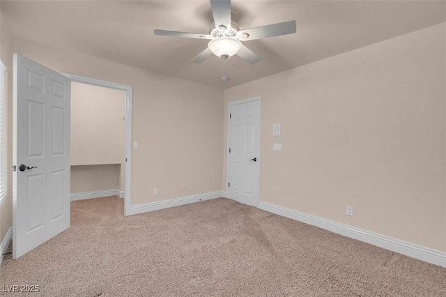 1312 Fragrant Spruce Ave, Las Vegas, NV 89123 - unfurnished bedroom featuring carpet floors, baseboards, a walk in closet, and ceiling fan
