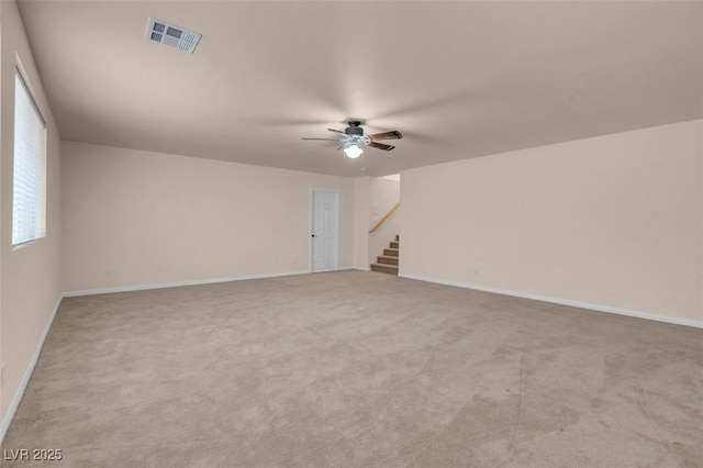 1312 Fragrant Spruce Ave, Las Vegas, NV 89123 - carpeted spare room featuring a ceiling fan, stairs, and baseboards