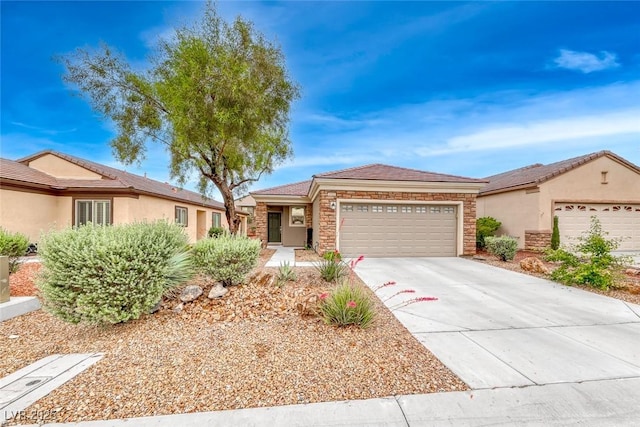 2522 Darda St, Henderson, NV 89044 - single story home with an attached garage, stone siding, and driveway