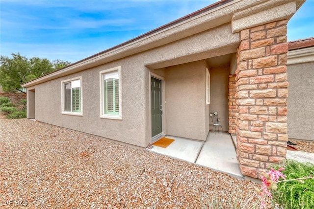 2522 Darda St, Henderson, NV 89044 - property entrance featuring stucco siding and stone siding