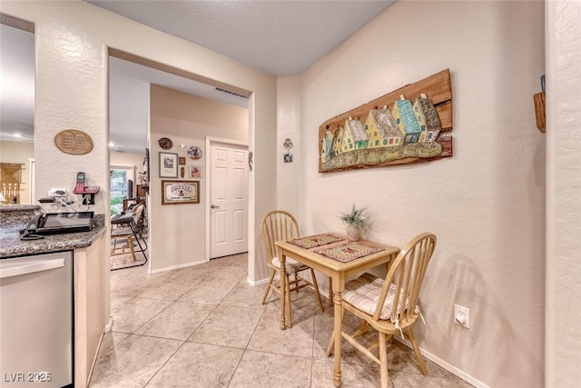 2522 Darda St, Henderson, NV 89044 - dining room with light tile patterned floors and baseboards
