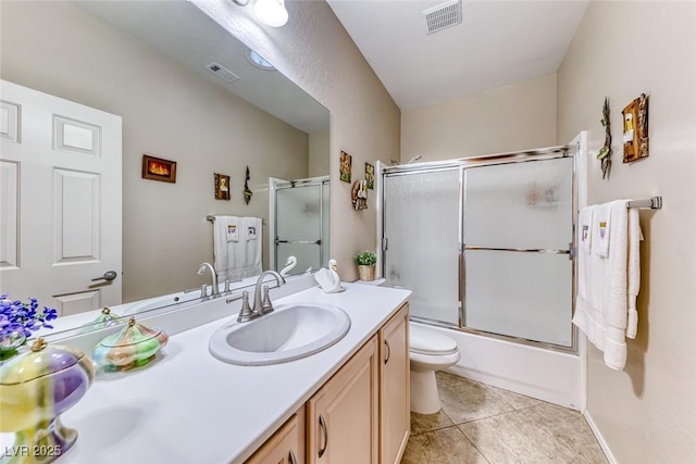 2522 Darda St, Henderson, NV 89044 - bathroom featuring double vanity, toilet, combined bath / shower with glass door, and tile patterned flooring