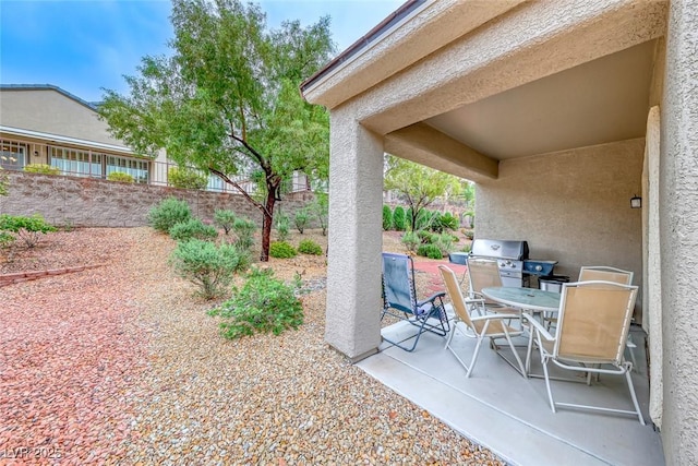 2522 Darda St, Henderson, NV 89044 - view of patio with a grill and outdoor dining space