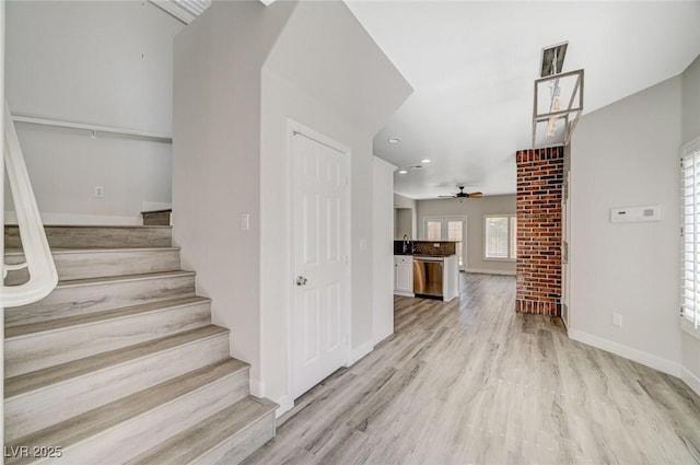 5931 Allanche Ave, Las Vegas, NV 89141 - staircase with a ceiling fan, wood finished floors, and recessed lighting