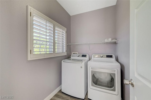5931 Allanche Ave, Las Vegas, NV 89141 - laundry area featuring washer and dryer and wood finished floors