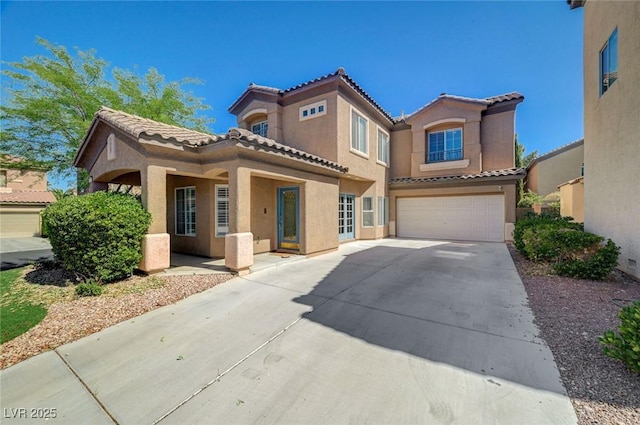 5931 Allanche Ave, Las Vegas, NV 89141 - mediterranean / spanish house with a tile roof, an attached garage, stucco siding, and driveway