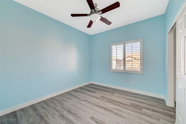 5931 Allanche Ave, Las Vegas, NV 89141 - empty room with wood finished floors and a ceiling fan