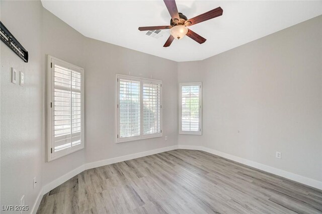 5931 Allanche Ave, Las Vegas, NV 89141 - unfurnished bedroom with light wood-style floors, a closet, and a ceiling fan