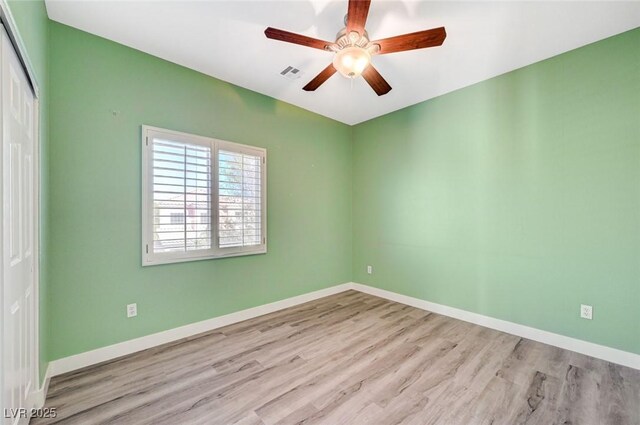 5931 Allanche Ave, Las Vegas, NV 89141 - spare room featuring wood finished floors and a ceiling fan