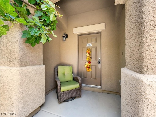 4563 Townwall St, Las Vegas, NV 89115 - property entrance with stucco siding