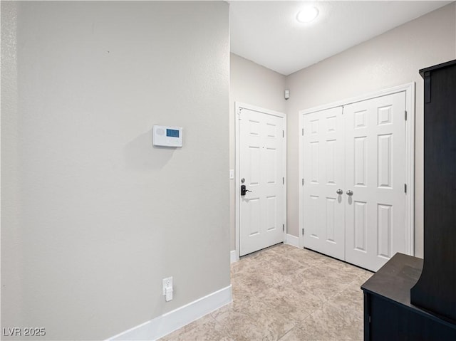 4563 Townwall St, Las Vegas, NV 89115 - entryway featuring baseboards and light tile patterned floors