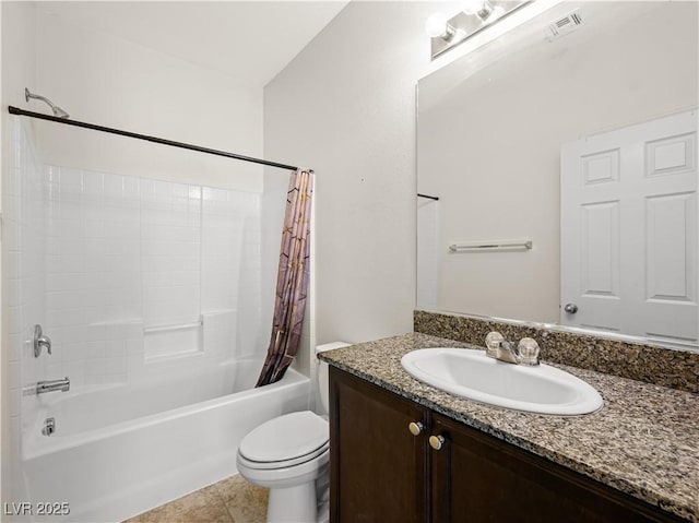 4563 Townwall St, Las Vegas, NV 89115 - full bath with shower / bath combo, vanity, toilet, and tile patterned flooring