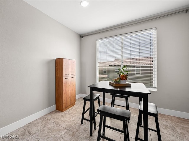 4563 Townwall St, Las Vegas, NV 89115 - dining space featuring baseboards, light tile patterned flooring, and recessed lighting