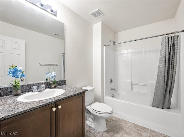 4563 Townwall St, Las Vegas, NV 89115 - bathroom with vanity, shower / bath combo with shower curtain, toilet, and tile patterned floors