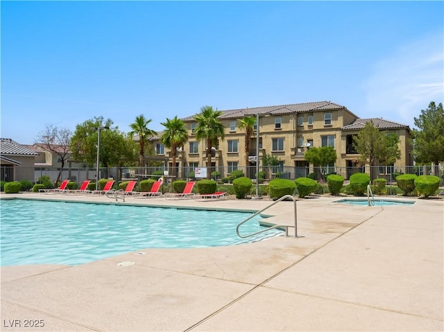 4563 Townwall St, Las Vegas, NV 89115 - community pool with a patio area
