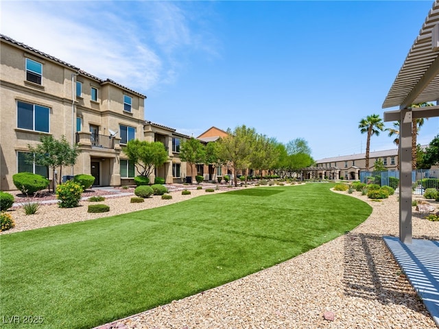 4563 Townwall St, Las Vegas, NV 89115 - view of property's community with a residential view and a yard