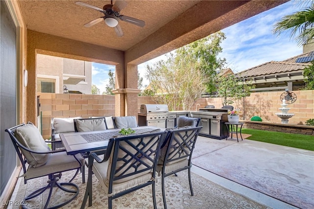 1272 Olivia Pkwy, Henderson, NV 89011 - fenced backyard featuring a patio, a grill, a ceiling fan, and outdoor dining area