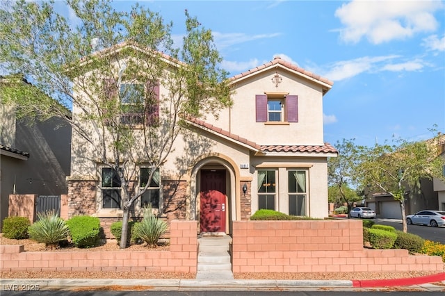 10917 Mount Pendleton St, Las Vegas, NV 89179 - mediterranean / spanish house with a tile roof and stucco siding