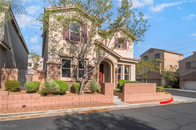 10917 Mount Pendleton St, Las Vegas, NV 89179 - view of front of property with stucco siding and stone siding
