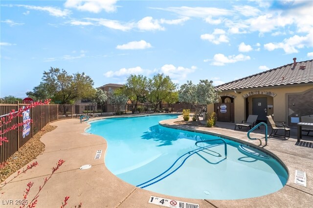 10917 Mount Pendleton St, Las Vegas, NV 89179 - community pool featuring a patio area