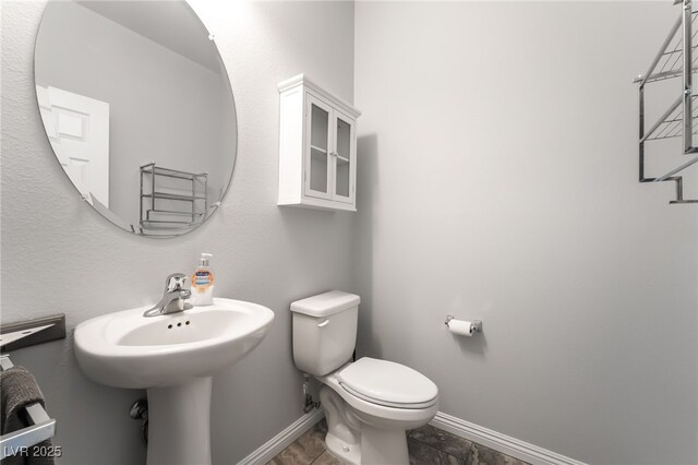 10917 Mount Pendleton St, Las Vegas, NV 89179 - bathroom with baseboards and toilet
