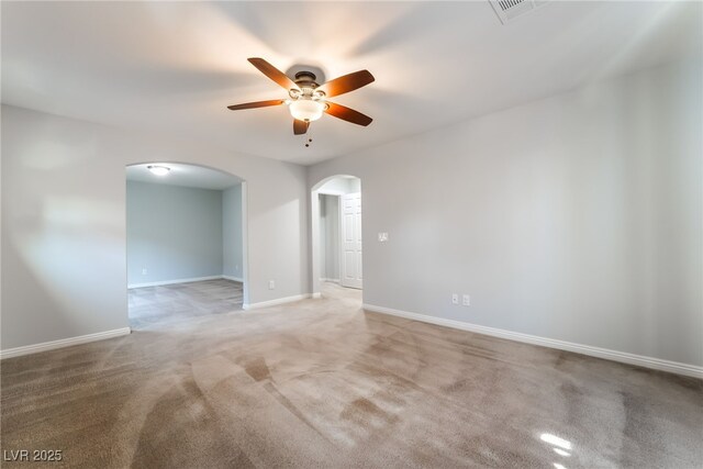 10917 Mount Pendleton St, Las Vegas, NV 89179 - carpeted spare room featuring arched walkways, ceiling fan, and baseboards